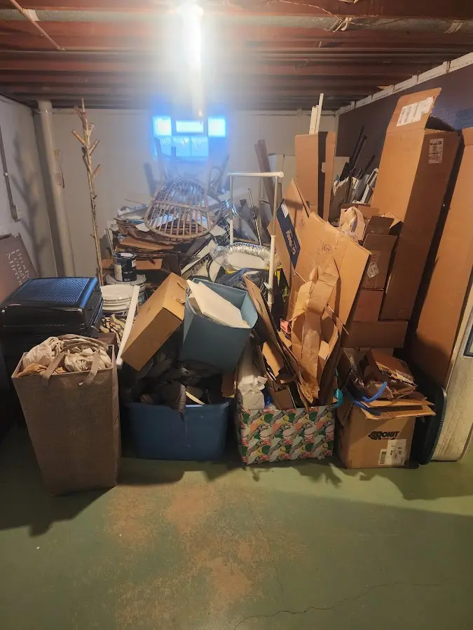 Roll-off dumpster container at job site for 2 Yard Dumpster Rental in Norwalk